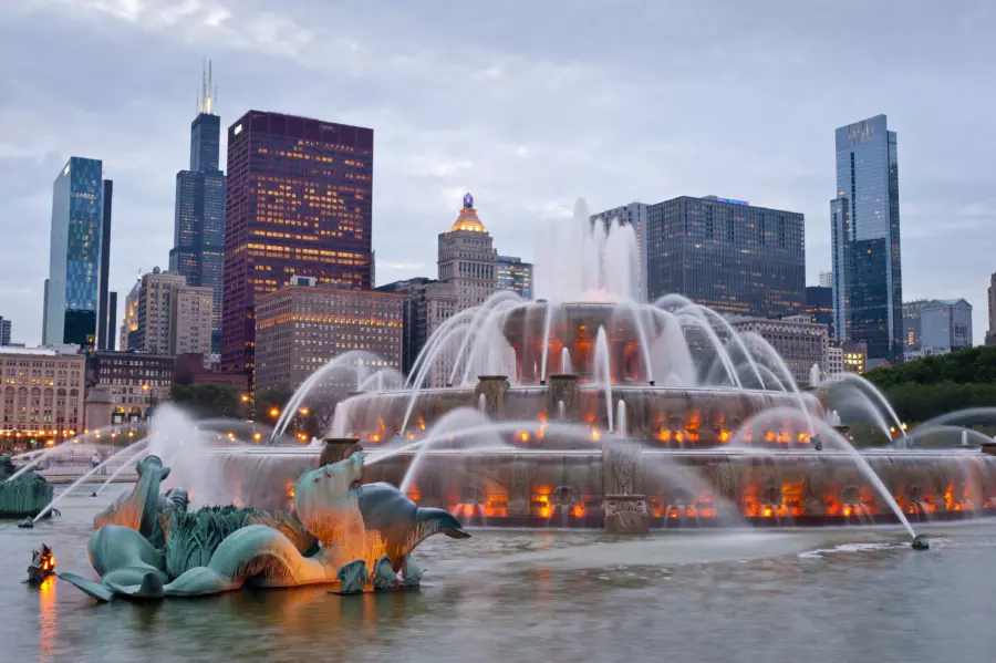 big fountains near the river of a city 