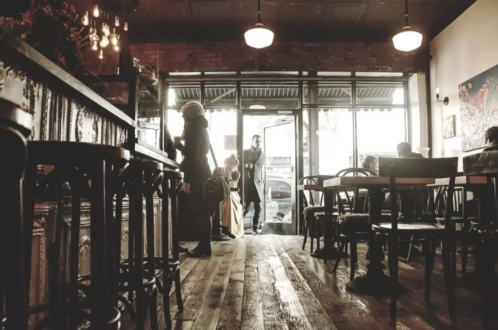 tables and chairs in a restaurant photographed from the frog perspective