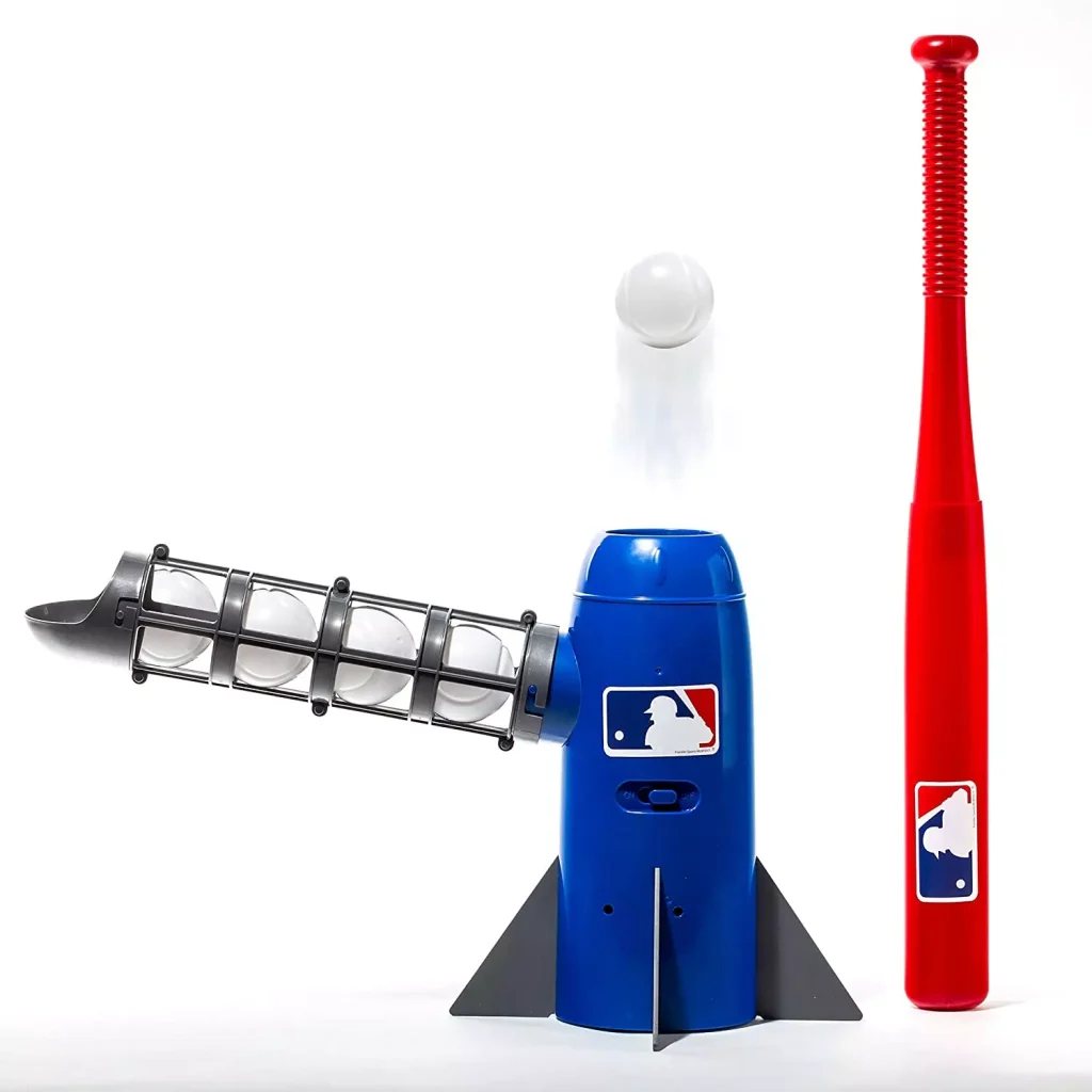 a baseball bat next to a ball machine