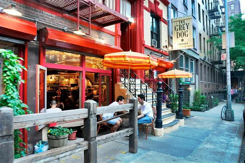 a coffee shop with red details photographed from the outside