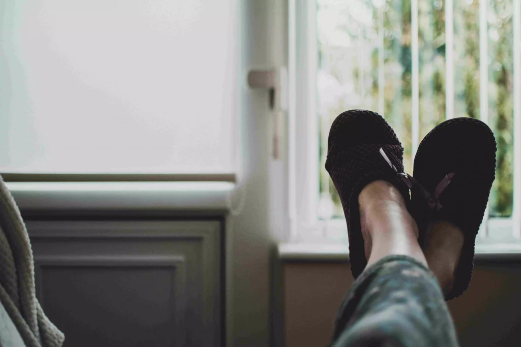 a person laying on a couch