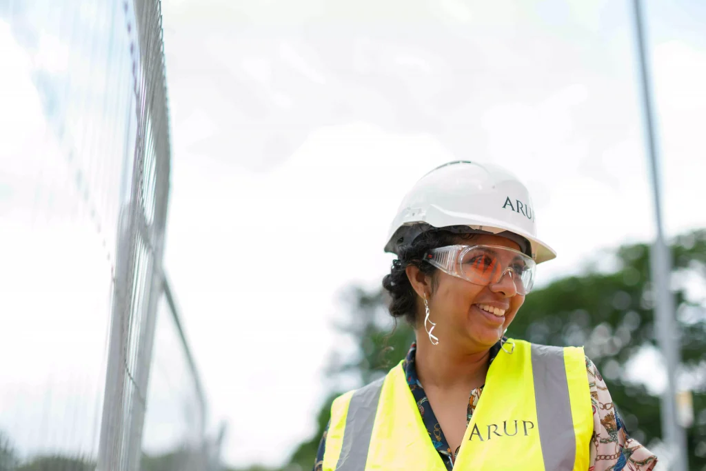 a girl in a white helmet and glasses