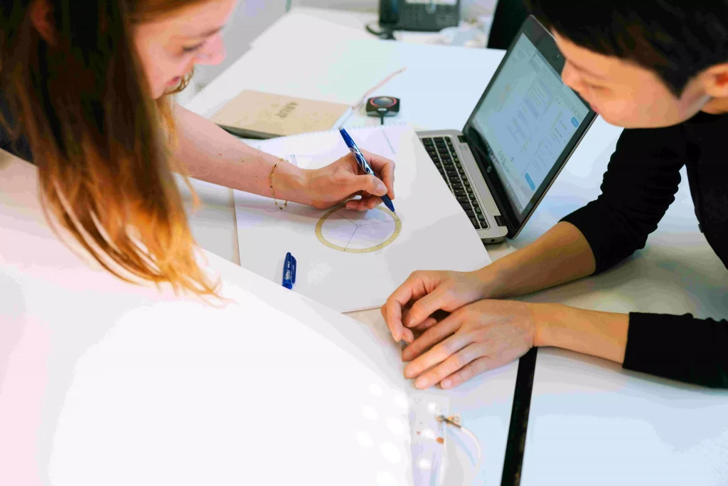 a man and a women working on something together