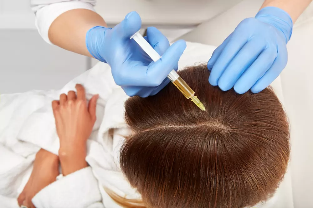 a women getting examined by a doctor