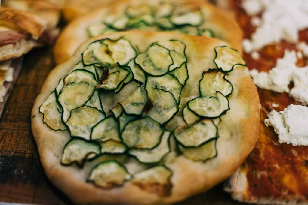 bread with vegetables on top of it