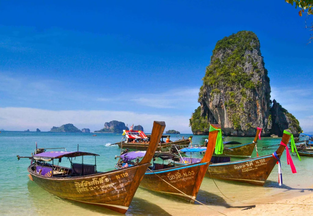 small boats parked near the beach 