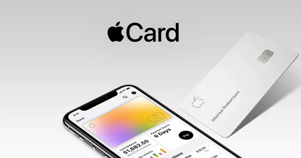 an iPhone next to a white credit card